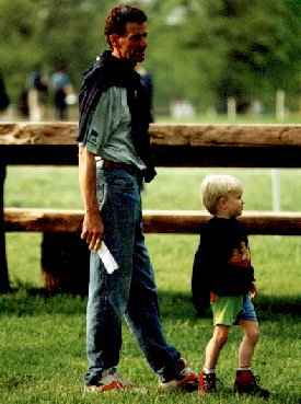 Mark Todd and son James walking the course